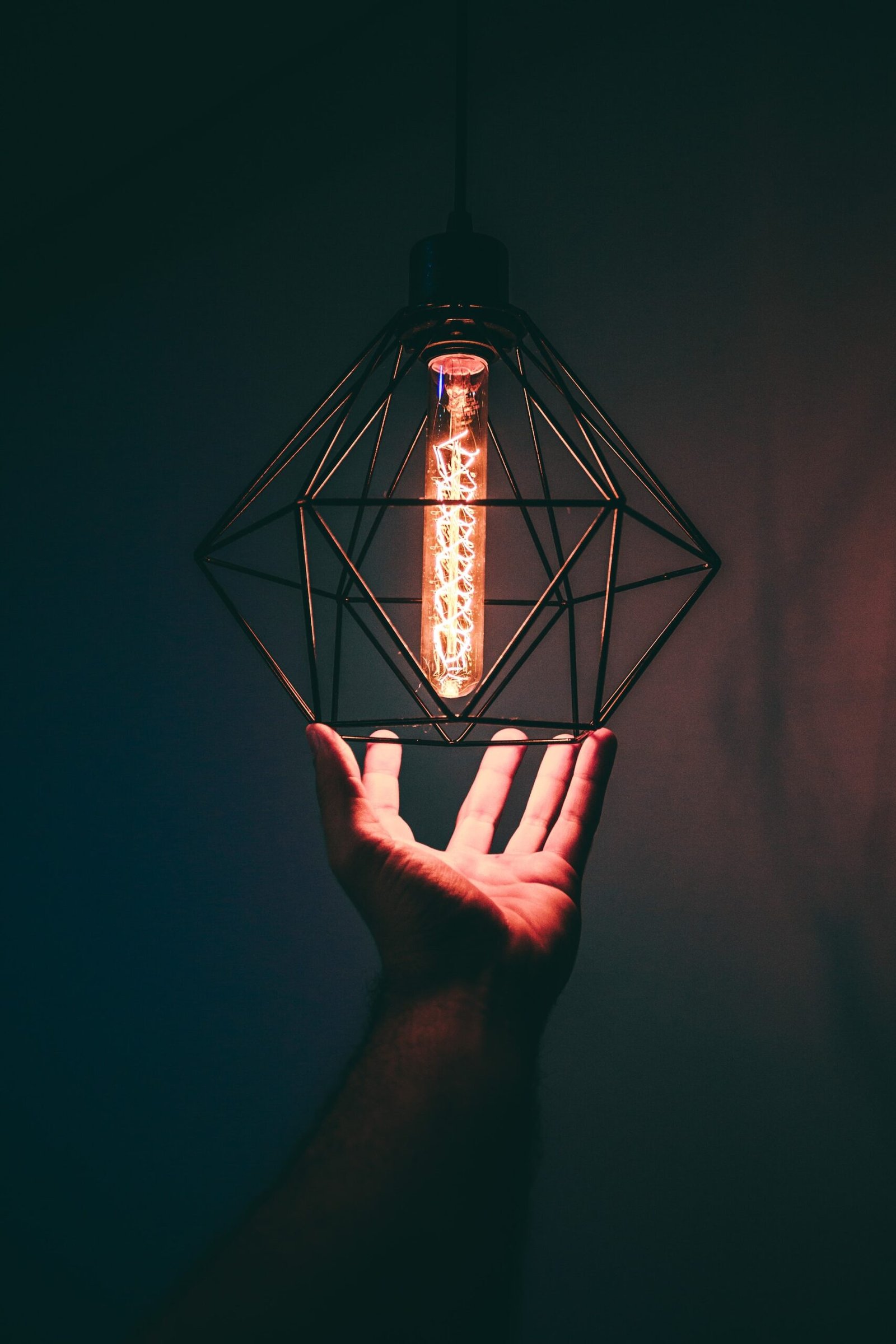 Hand steadying light with filament globe